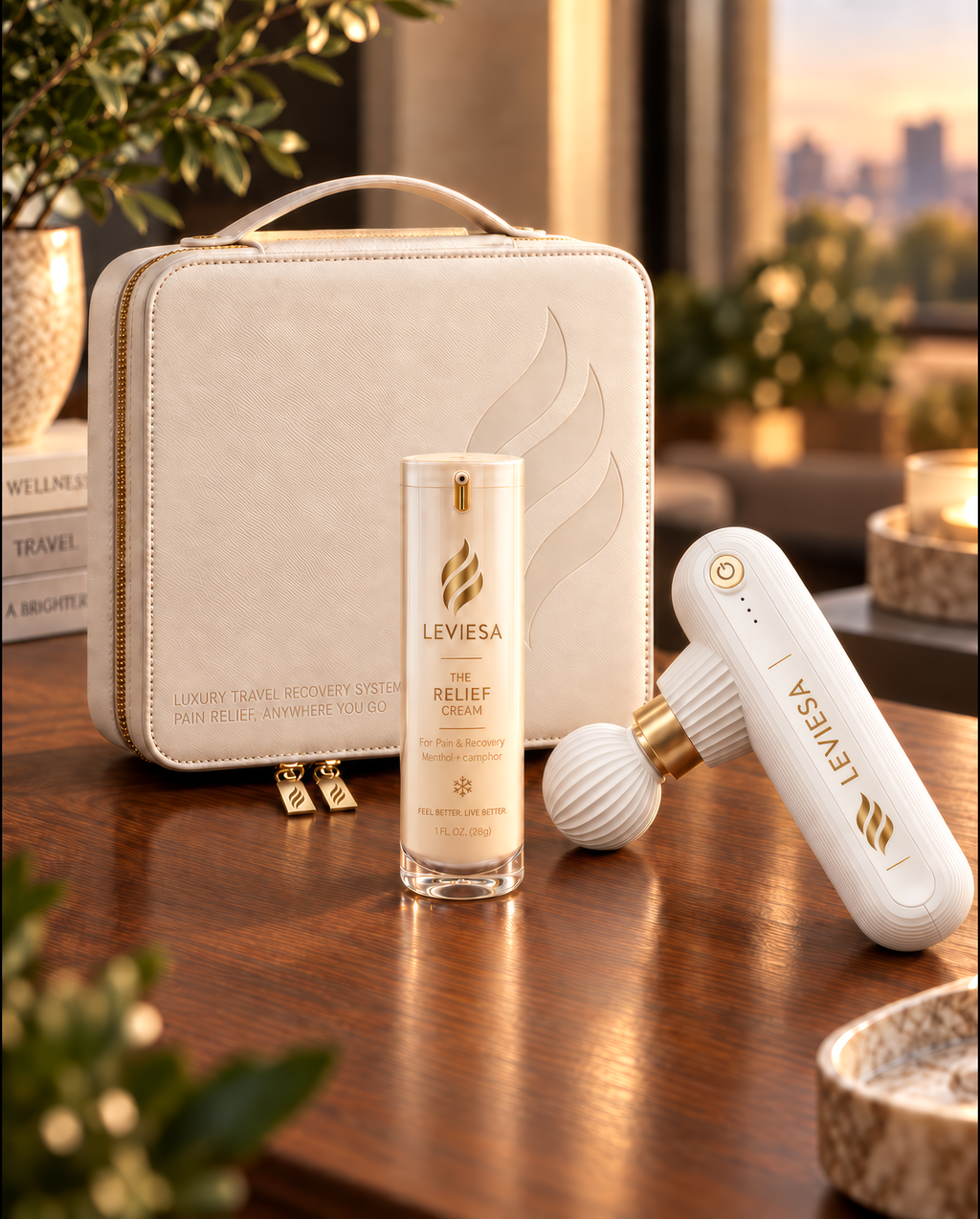 LEVIESA Travel Recovery System: ivory travel case with The Relief Cream and the portable massager on a wooden table